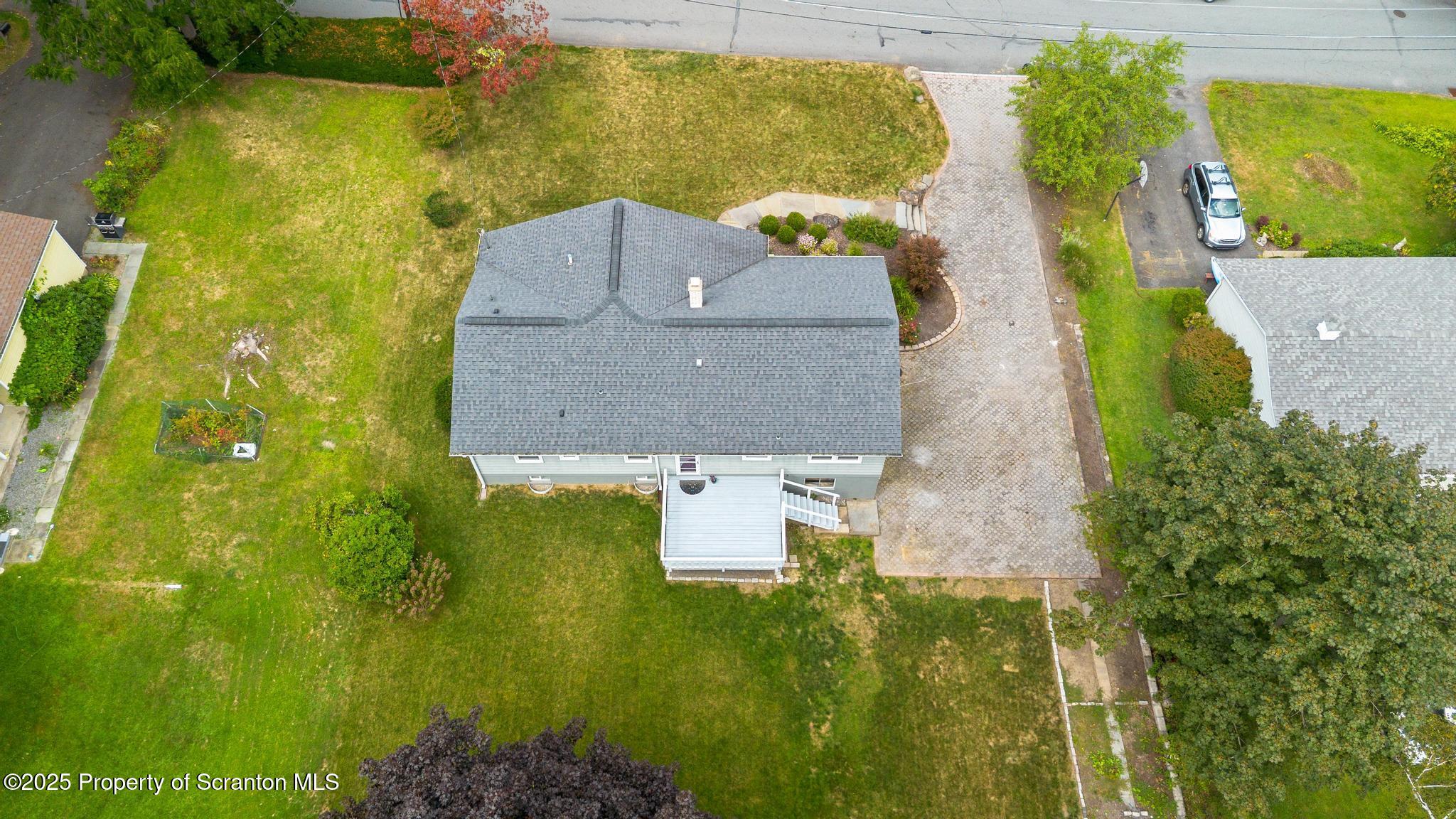 525 Knapp Road Clarks Summit, PA 18411 - Photo 44 of 45 an aerial view of a house with a yard