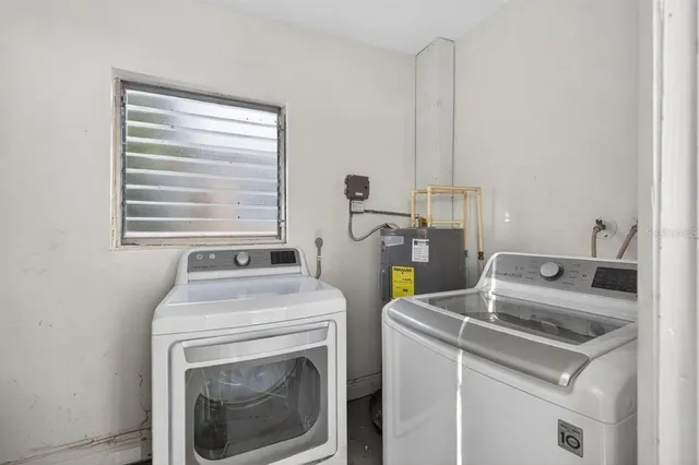 a utility room with dryer and washer
