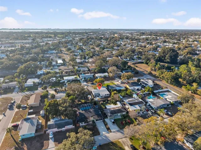 an aerial view of a city with lots of residential buildings