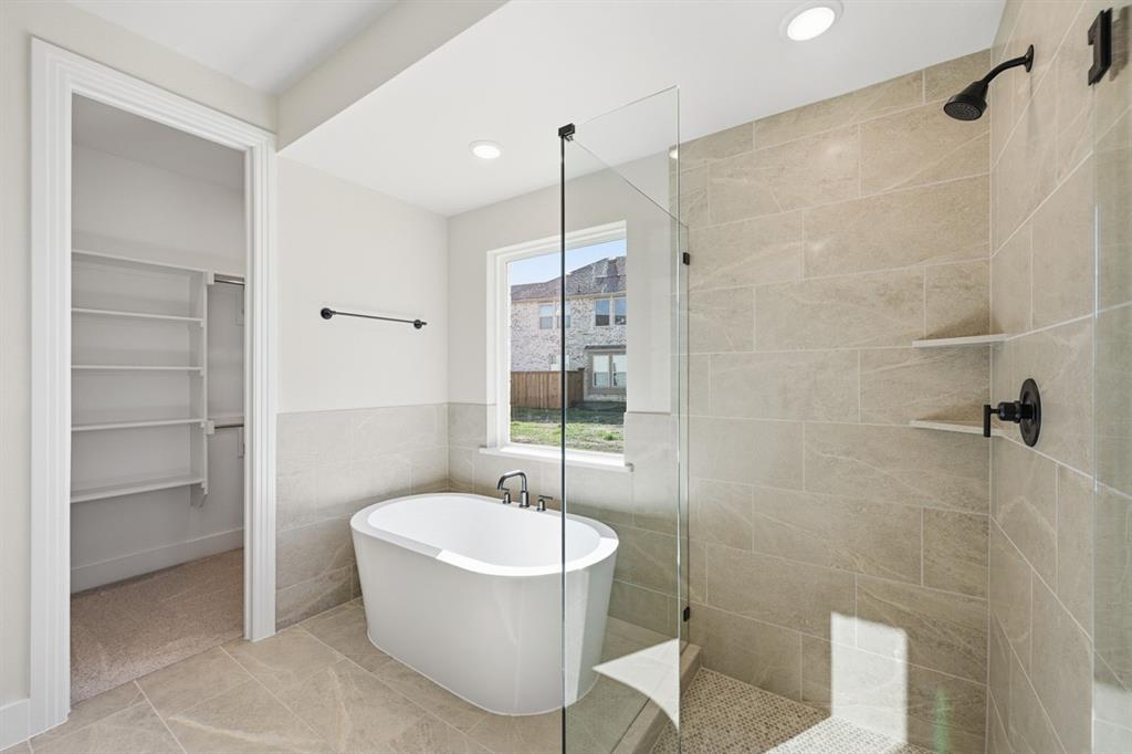 4408 Daisy Lane Prosper, TX 75078 - Photo 15 of 25 a bathroom with a sink and mirror