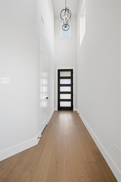 4408 Daisy Lane Prosper, TX 75078 - Photo 17 of 25 a view of a room with wooden floor and window