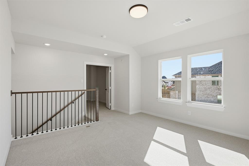 4408 Daisy Lane Prosper, TX 75078 - Photo 22 of 25 a view of livingroom with furniture and windows