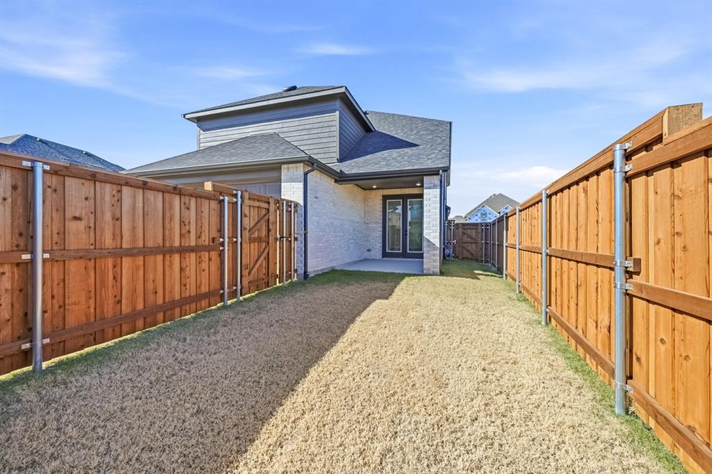 4408 Daisy Lane Prosper, TX 75078 - Photo 25 of 25 a view of backyard with wooden floor and fence