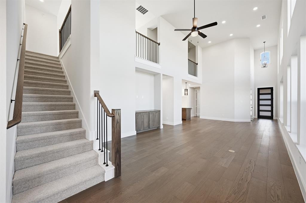 4408 Daisy Lane Prosper, TX 75078 - Photo 9 of 25 a view of an entryway with wooden floor