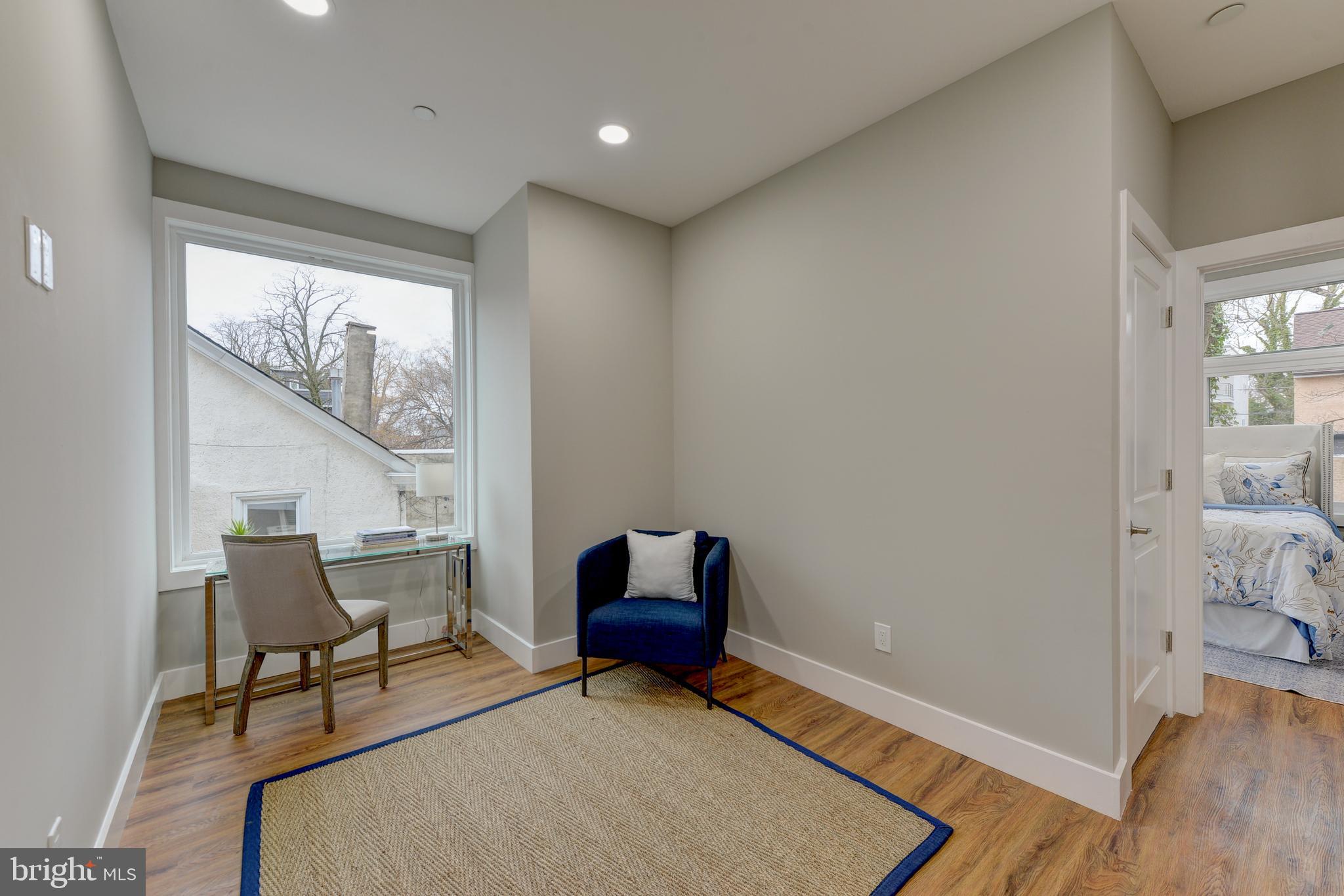 135 East Springer Street Philadelphia, PA 19119 - Photo 15 of 32 a living room with furniture and a window
