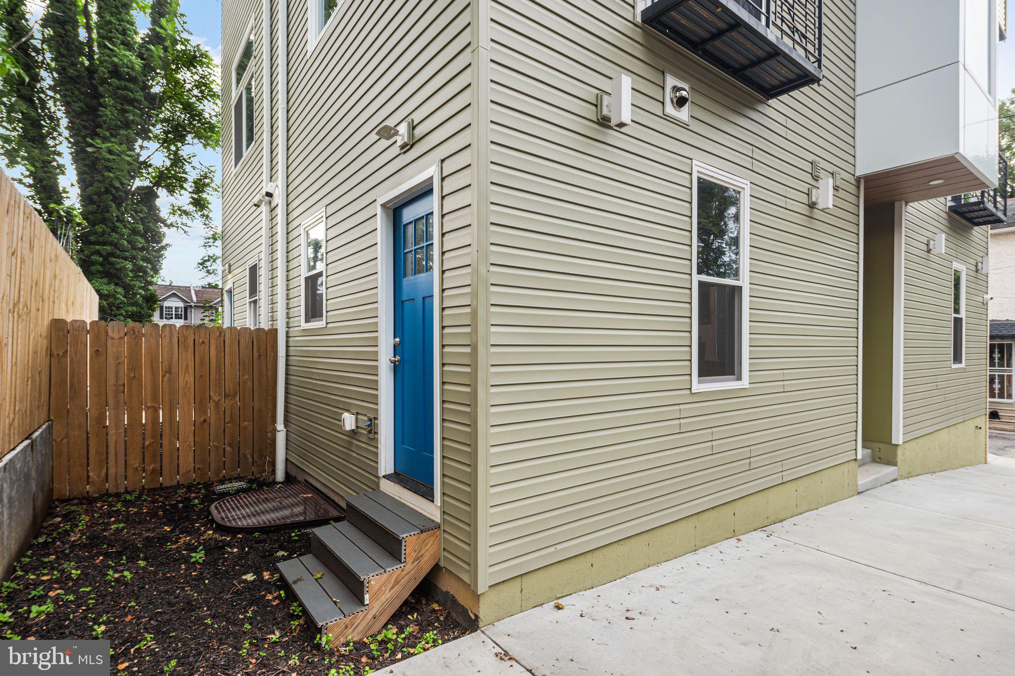 135 East Springer Street Philadelphia, PA 19119 - Photo 30 of 32 a view of a small house and a yard