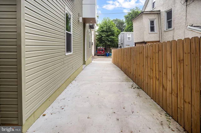 a view of a back yard of the house