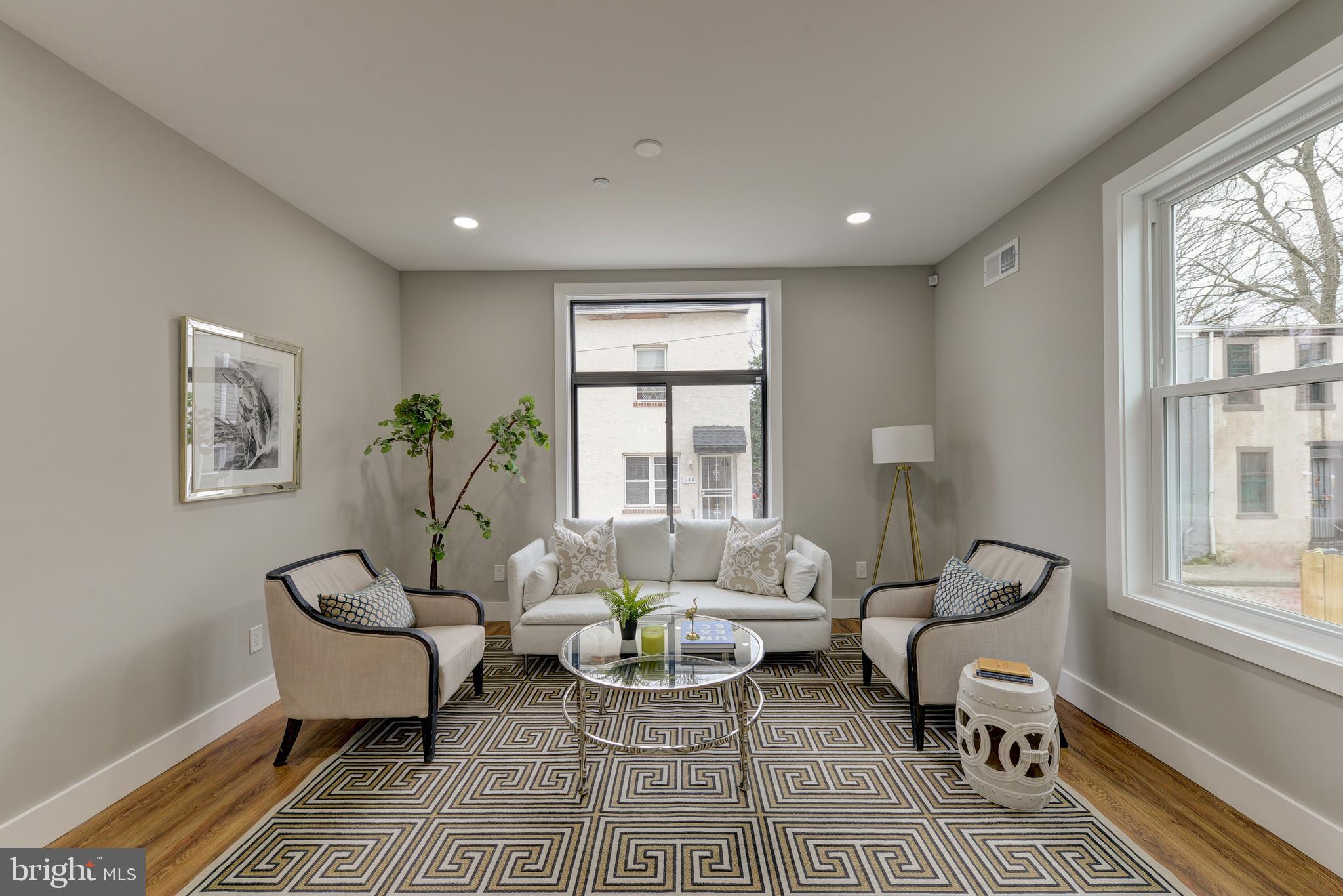 135 East Springer Street Philadelphia, PA 19119 - Photo 4 of 32 a living room with furniture and a window