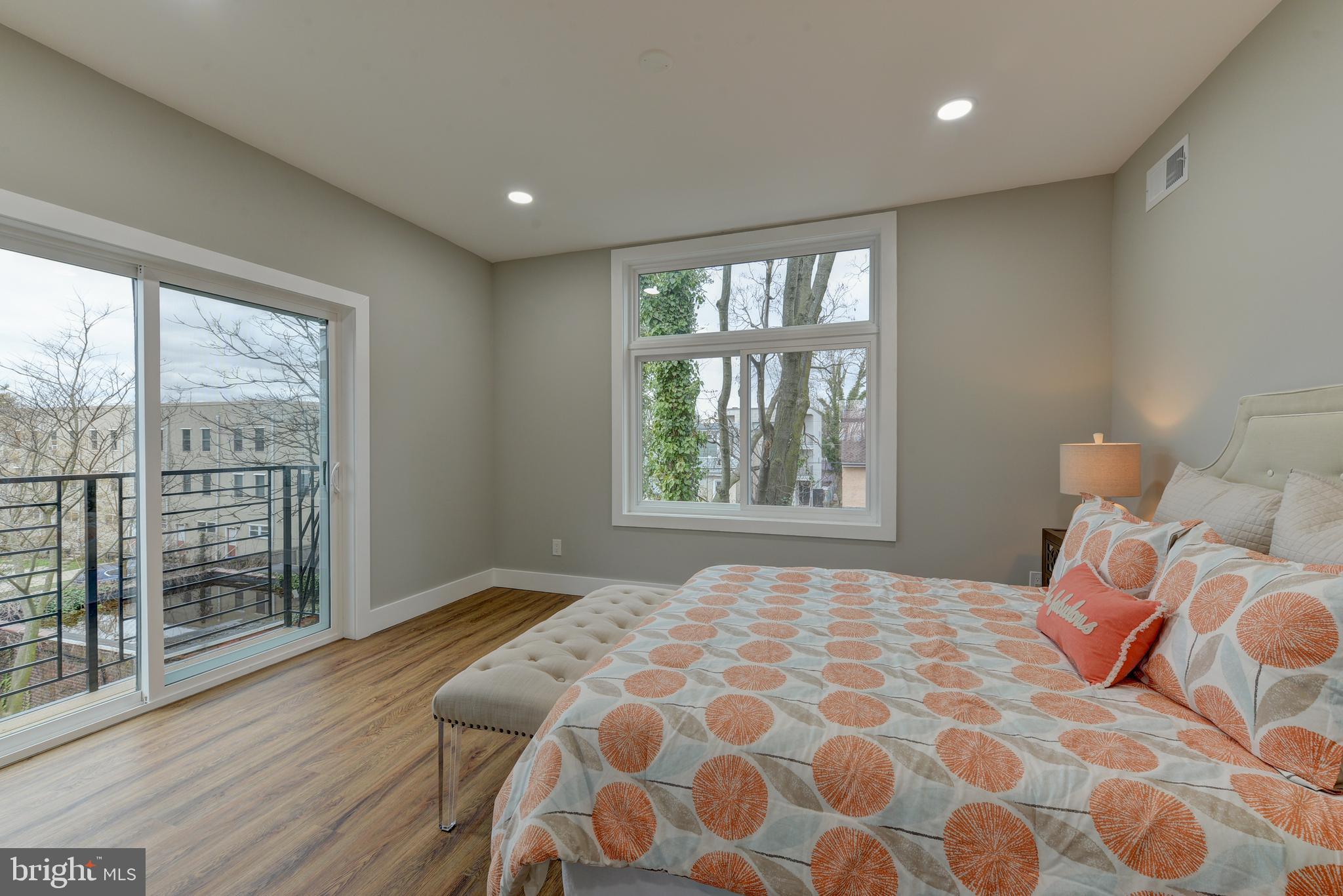 135 East Springer Street Philadelphia, PA 19119 - Photo 6 of 32 a bedroom with a bed and a window