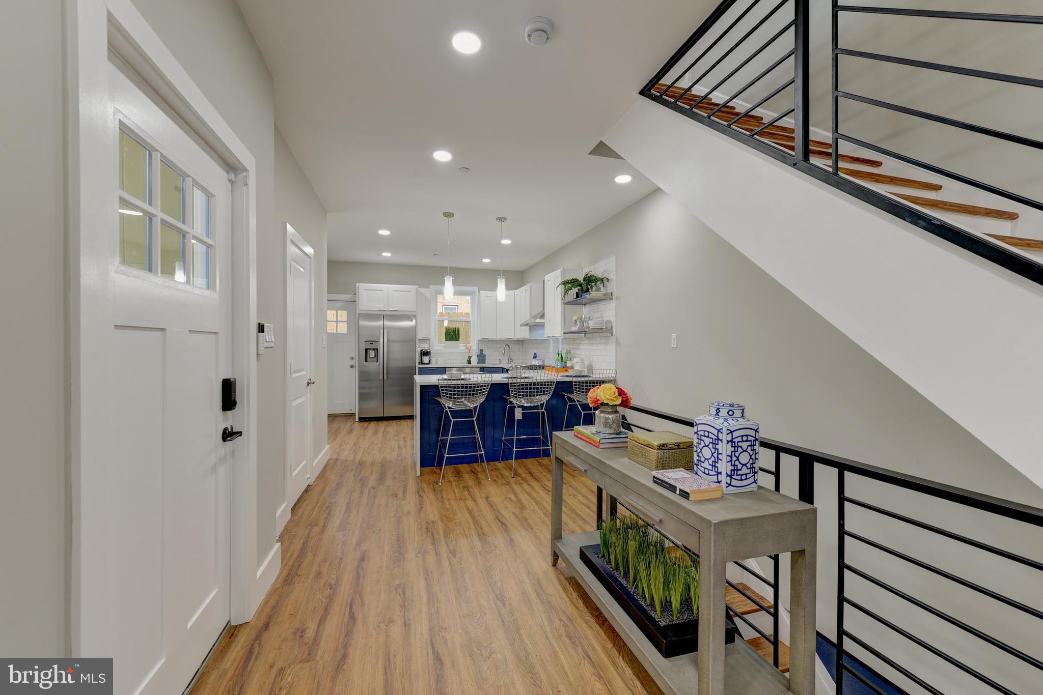 135 East Springer Street Philadelphia, PA 19119 - Photo 8 of 32 a view of a dining room with furniture window and wooden floor
