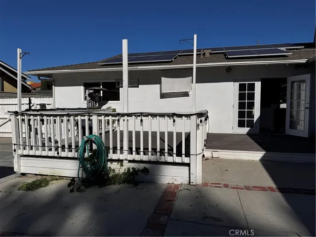 a view of balcony with furniture