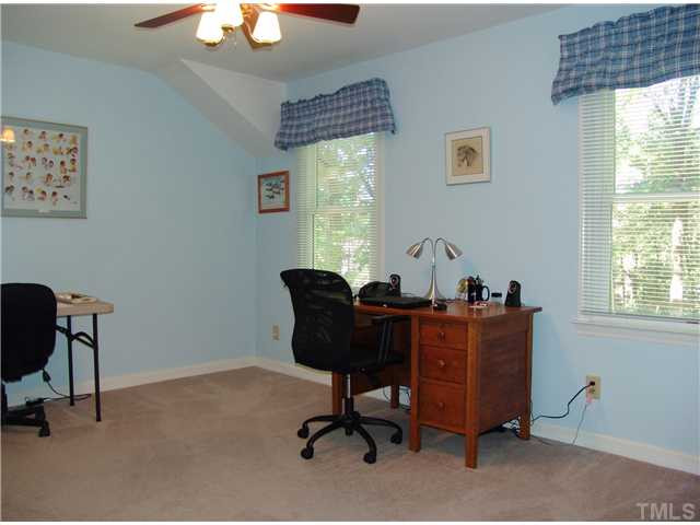 8516 Shadow Wood Place Raleigh, NC 27613 - Photo 20 of 25 This bedroom also has two windows looking over the backyard. Bedroom