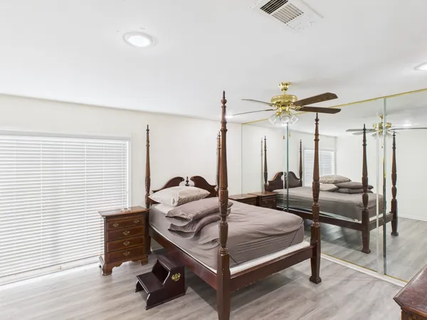 a bathroom with a double vanity sink and