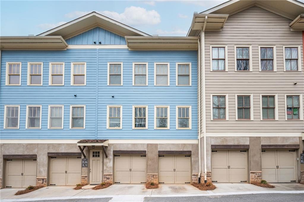 1628 Briarcliff Road Northeast, Unit 9 Atlanta, GA 30306 - Photo 1 of 25 a front view of a building with many windows
