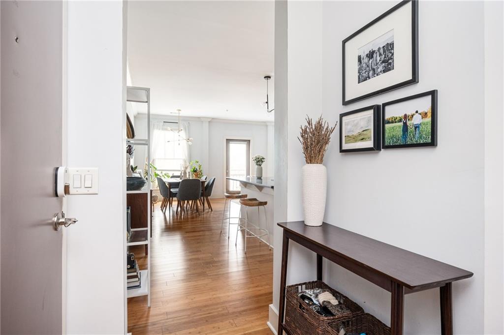 1628 Briarcliff Road Northeast, Unit 9 Atlanta, GA 30306 - Photo 14 of 25 a view of a livingroom with furniture and wooden floor