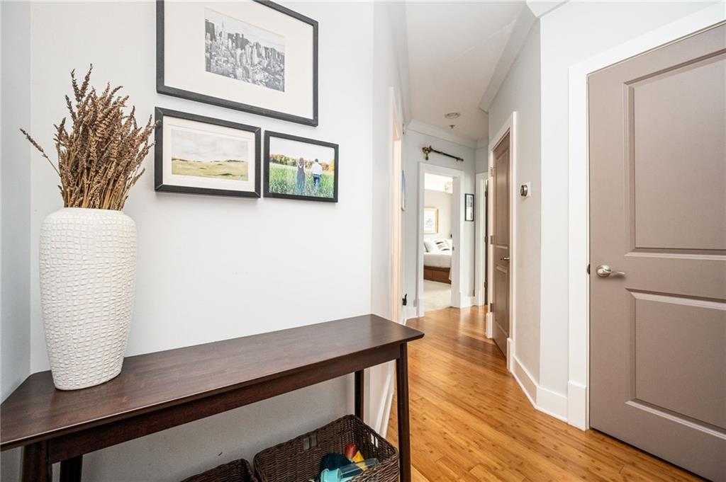1628 Briarcliff Road Northeast, Unit 9 Atlanta, GA 30306 - Photo 15 of 25 a view of a hallway with seating area