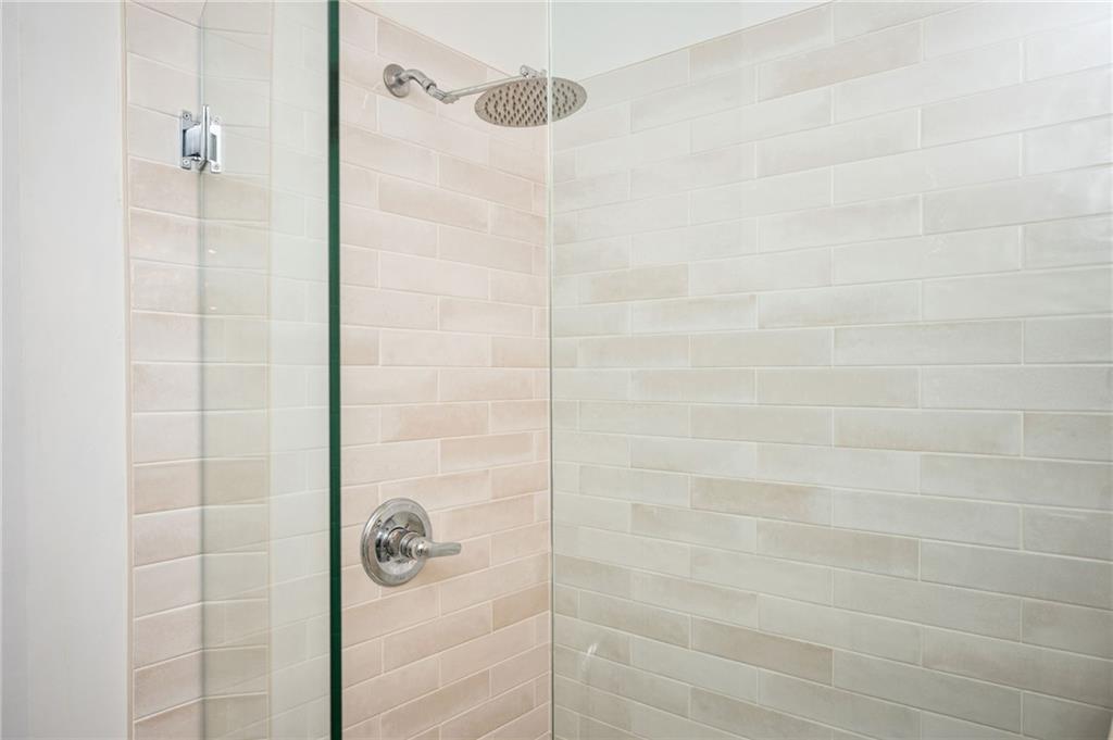 1628 Briarcliff Road Northeast, Unit 9 Atlanta, GA 30306 - Photo 20 of 25 a bathroom with a shower