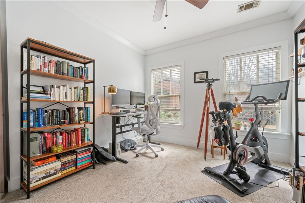1628 Briarcliff Road Northeast, Unit 9 Atlanta, GA 30306 - Photo 23 of 25 a view of a room with gym equipment