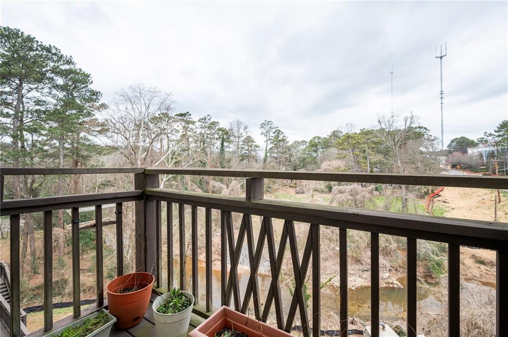 1628 Briarcliff Road Northeast, Unit 9 Atlanta, GA 30306 - Photo 24 of 25 a view of a balcony with an outdoor space