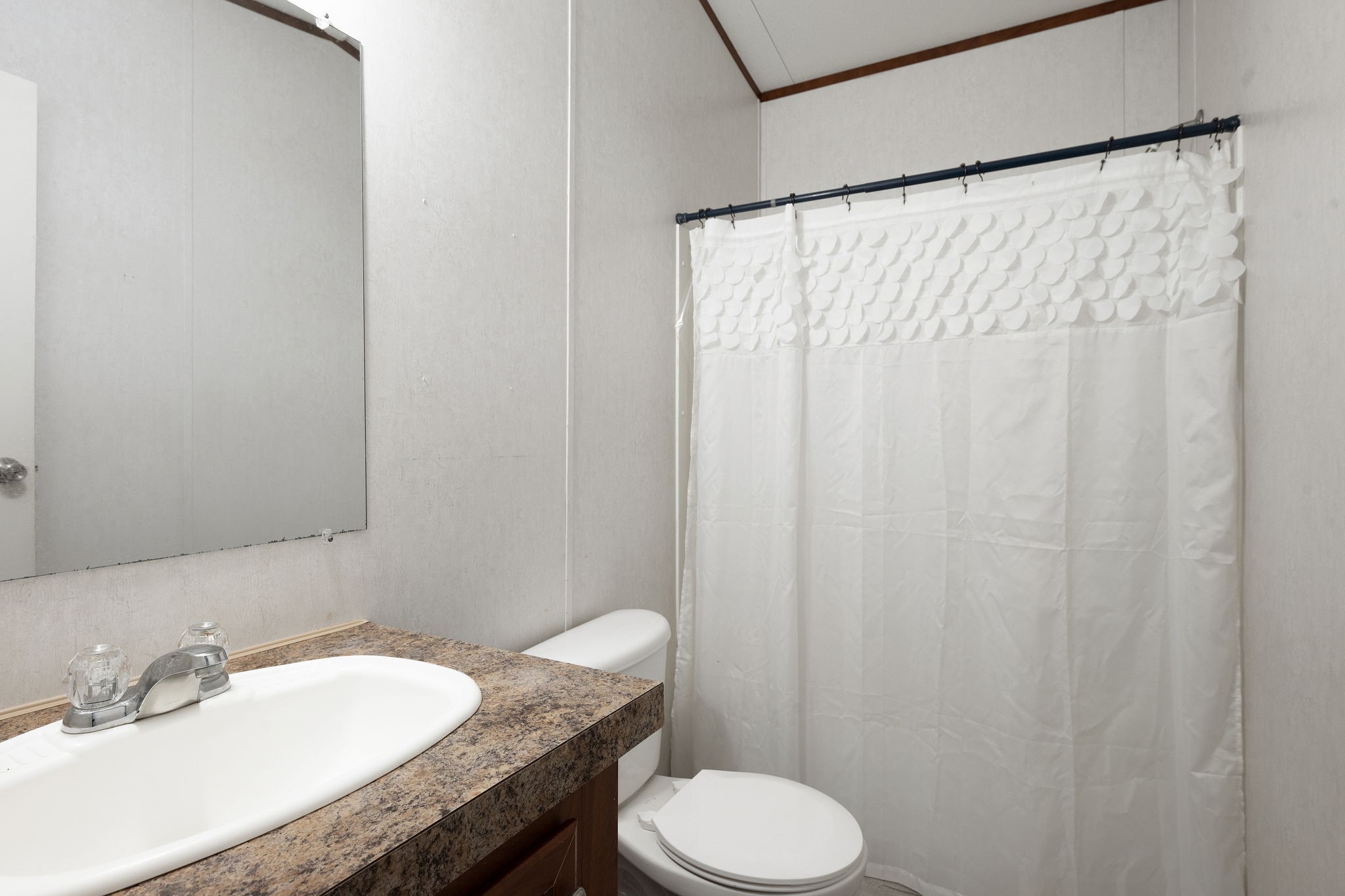 6493 Pappas Road Waller, TX 77484 - Photo 13 of 28 Full bathroom with vanity storage and tub/shower combination.
Designed for everyday use with a straightforward layout and easy maintenance.