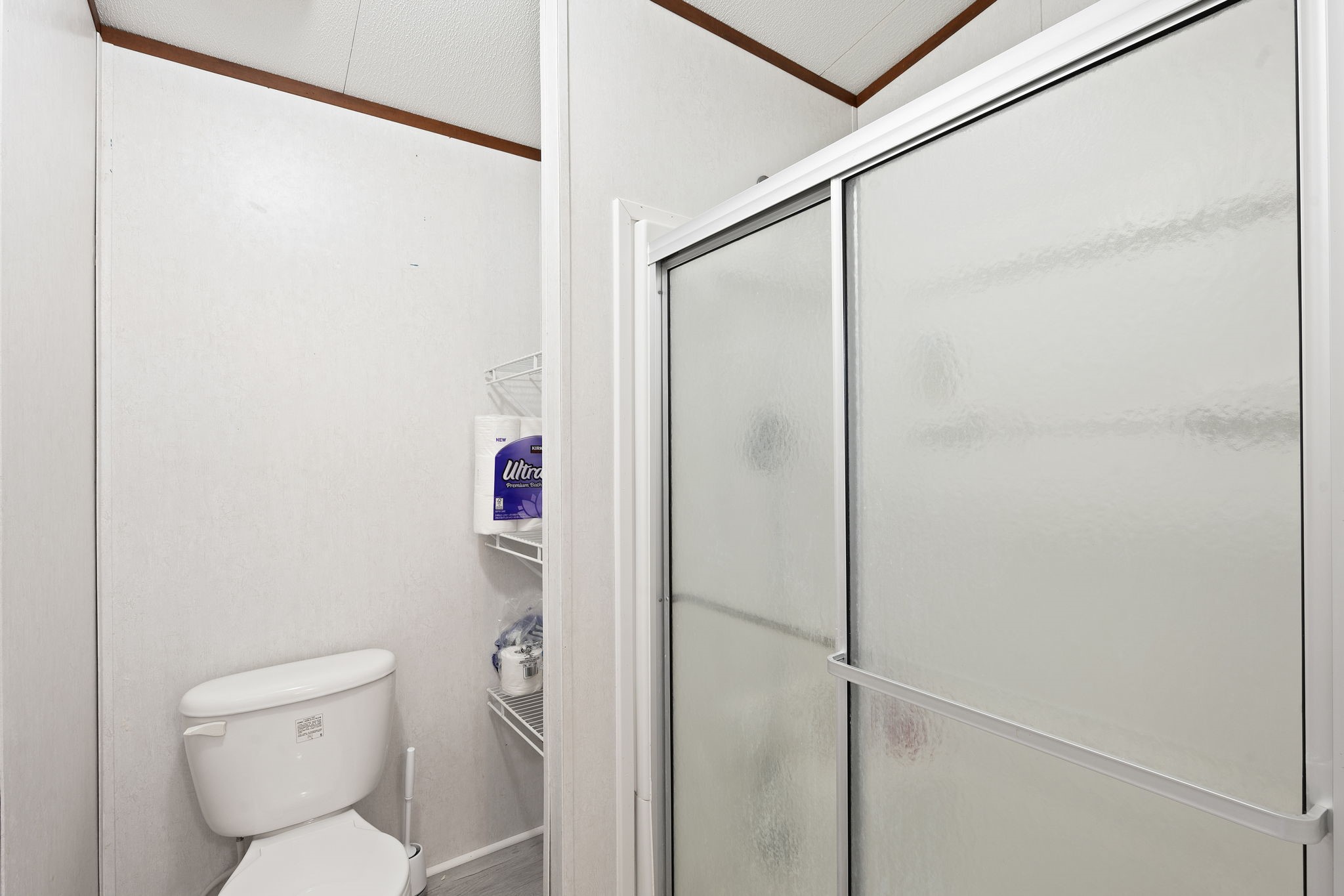 6493 Pappas Road Waller, TX 77484 - Photo 18 of 28 Separate shower and private toilet room for enhanced layout functionality in the primary suite bathroom.