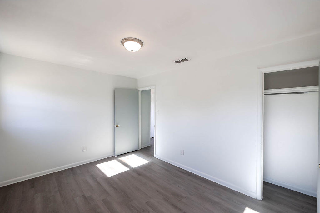 532 54th Street Lubbock, TX 79404 - Photo 14 of 19 a view of empty room with wooden floor