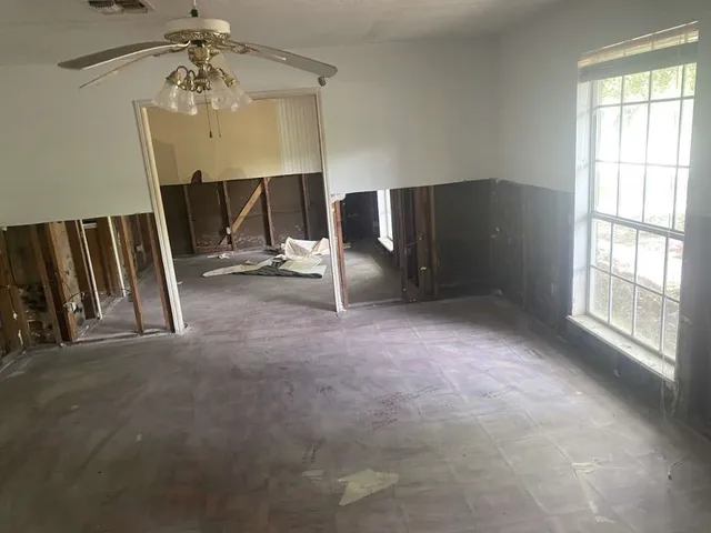 a view of livingroom with furniture and windows