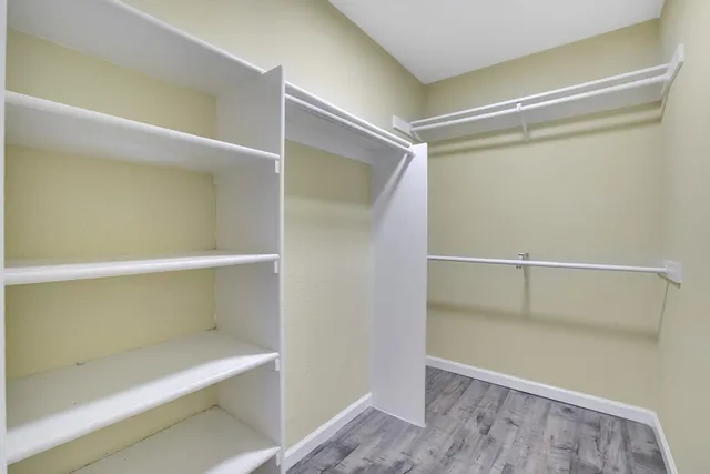 a view of an empty walk in closet