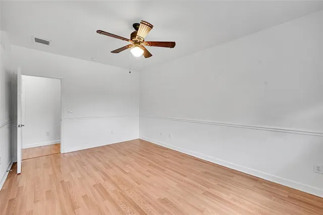 a view of an empty walk in closet