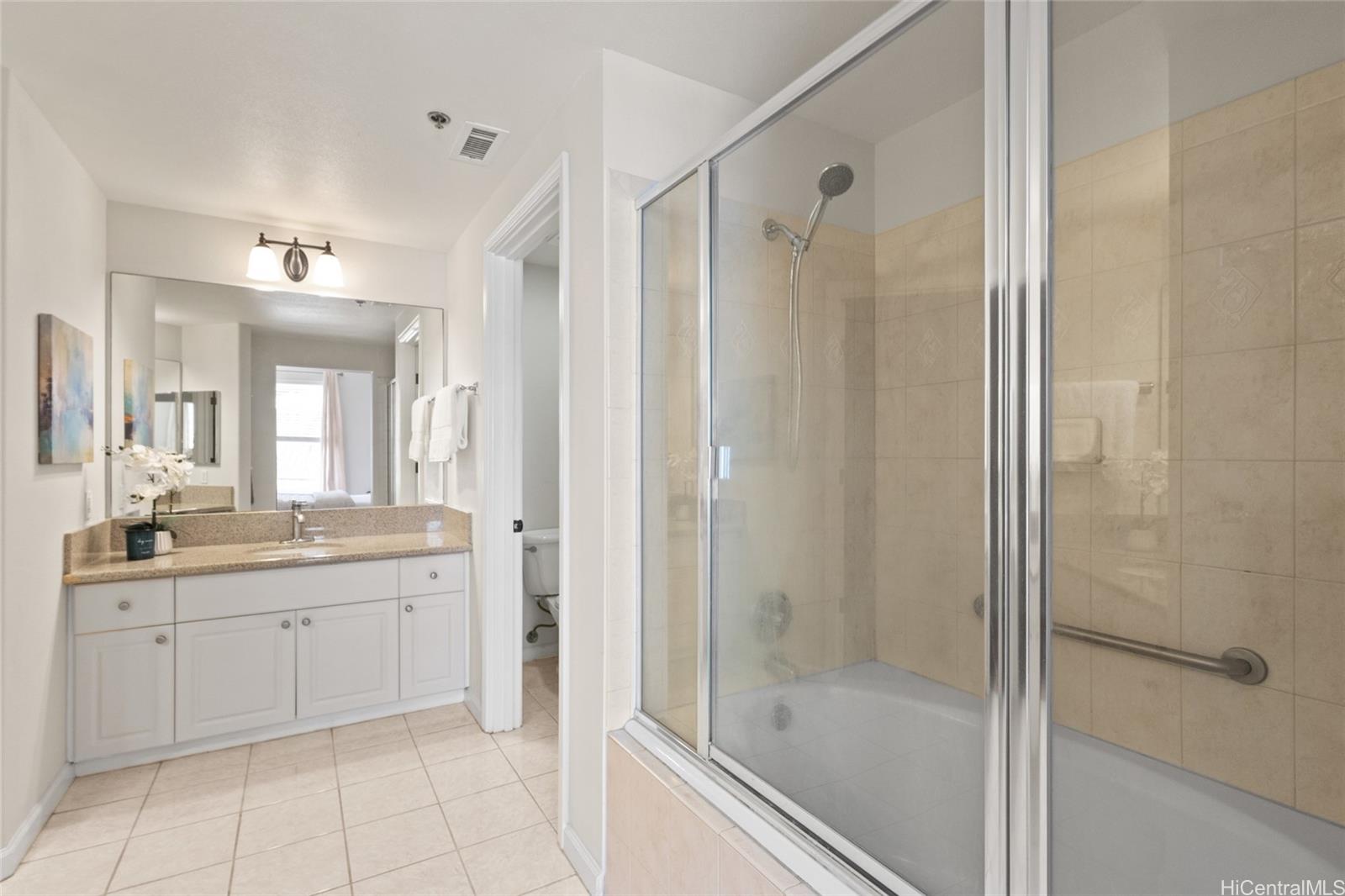 520 Lunalilo Home Road, Unit 8120 Honolulu, HI 96825 - Photo 13 of 25 Primary bathroom with deep tub