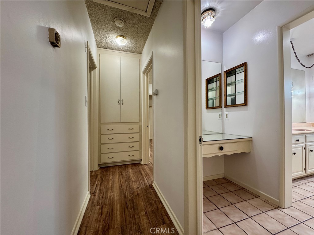 320 North Stoneman Avenue, Unit A Alhambra, CA 91801 - Photo 7 of 14 a view of a hallway with wooden floor and closet