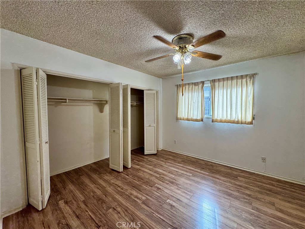 320 North Stoneman Avenue, Unit A Alhambra, CA 91801 - Photo 10 of 14 a view of an empty room with window and wooden floor