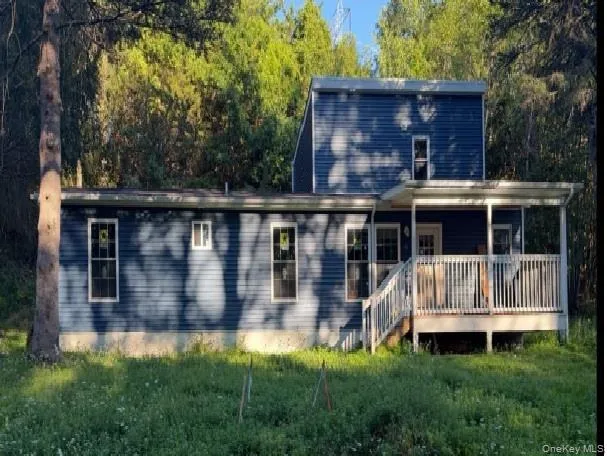 a view of deck with a yard
