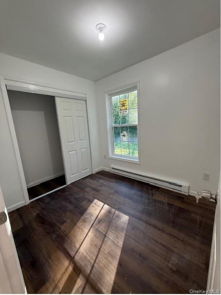 82 High Rock Road West Coxsackie, NY 12192 - Photo 13 of 23 an empty room with wooden floor and windows