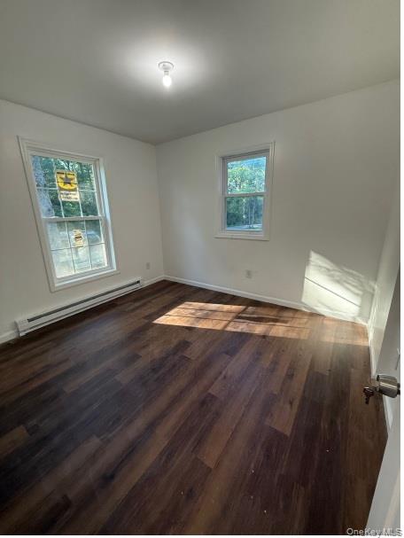 82 High Rock Road West Coxsackie, NY 12192 - Photo 15 of 23 an empty room with wooden floor and windows