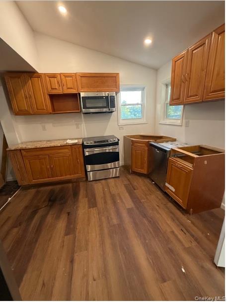 82 High Rock Road West Coxsackie, NY 12192 - Photo 6 of 23 a kitchen with stainless steel appliances a stove and wooden floor