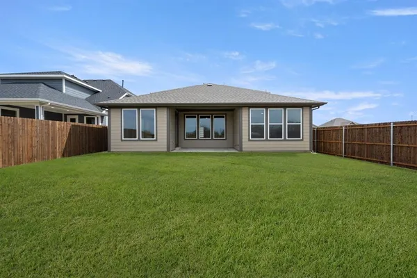 a house view with a garden space