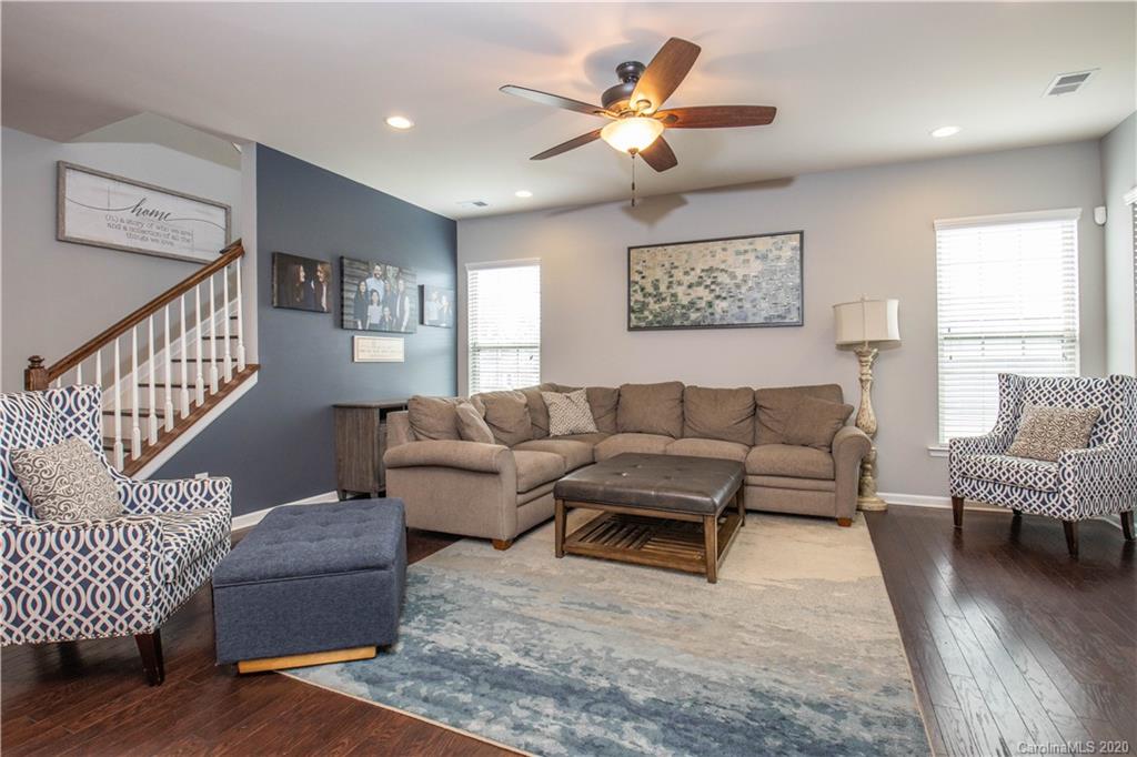 5149 Waterloo Drive Tega Cay, SC 29708 - Photo 2 of 28 a living room with furniture and a wooden floor