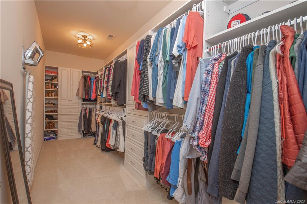5149 Waterloo Drive Tega Cay, SC 29708 - Photo 17 of 28 a view of walk in closet with clothes