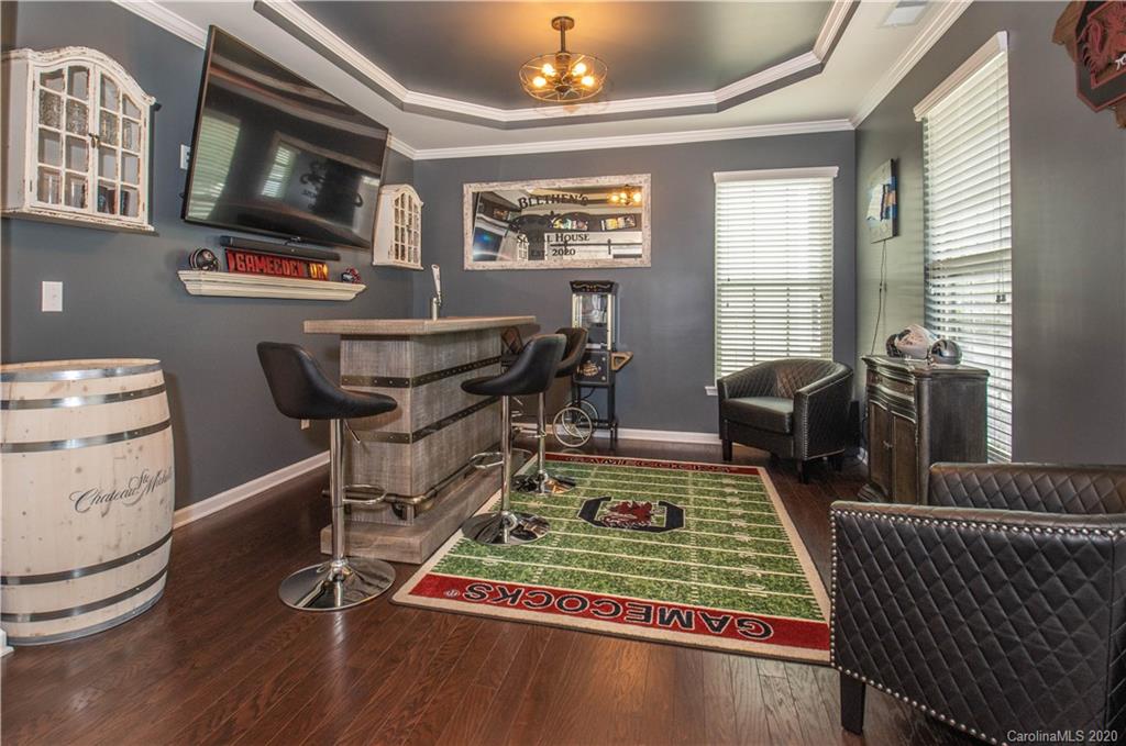 5149 Waterloo Drive Tega Cay, SC 29708 - Photo 9 of 28 a room with furniture pool table and windows