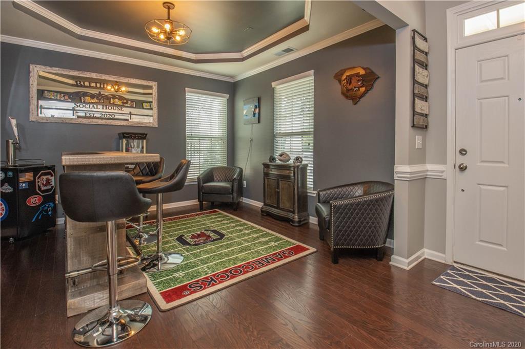 5149 Waterloo Drive Tega Cay, SC 29708 - Photo 10 of 28 a living room with furniture and a window