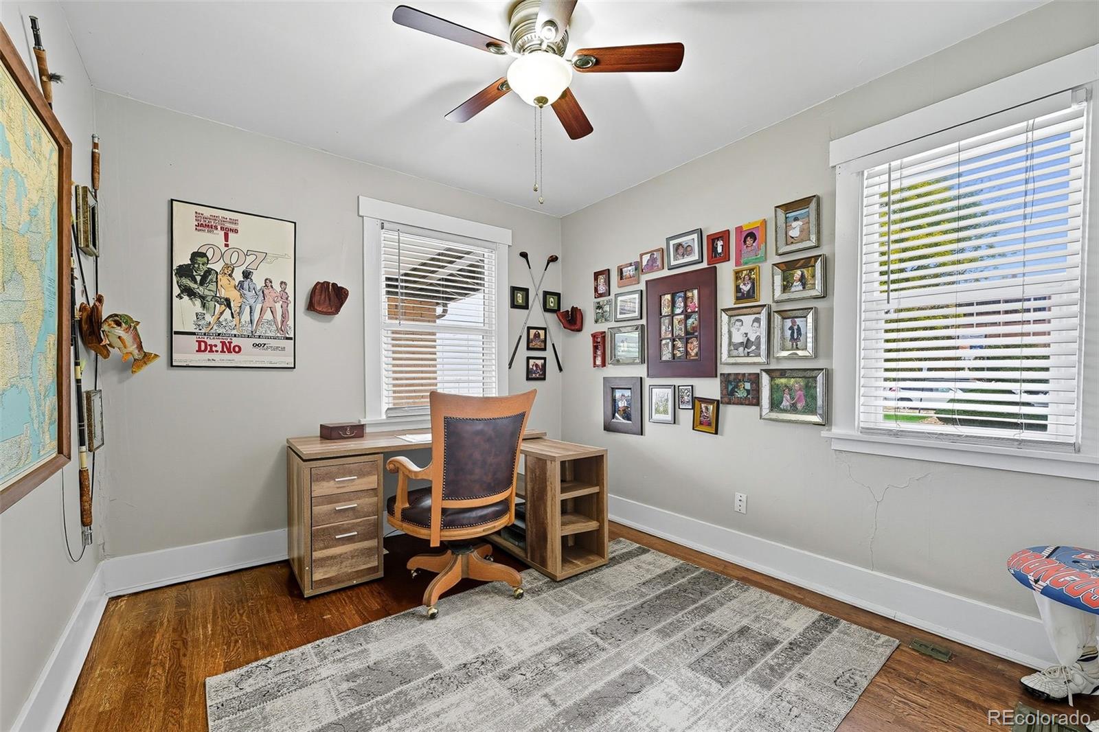 1280 Harrison Street Denver, CO 80206 - Photo 22 of 50 a dining room with wooden floor and a window