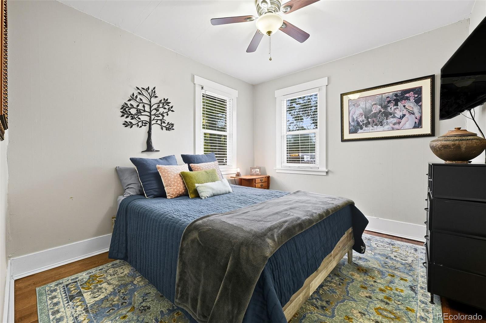 1280 Harrison Street Denver, CO 80206 - Photo 24 of 50 a bedroom with bed and window