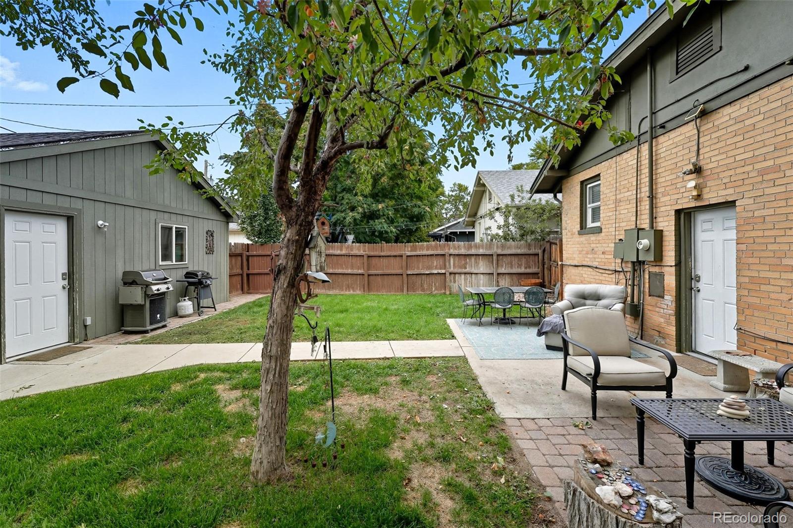 1280 Harrison Street Denver, CO 80206 - Photo 34 of 50 a view of yard in front of house with seating space