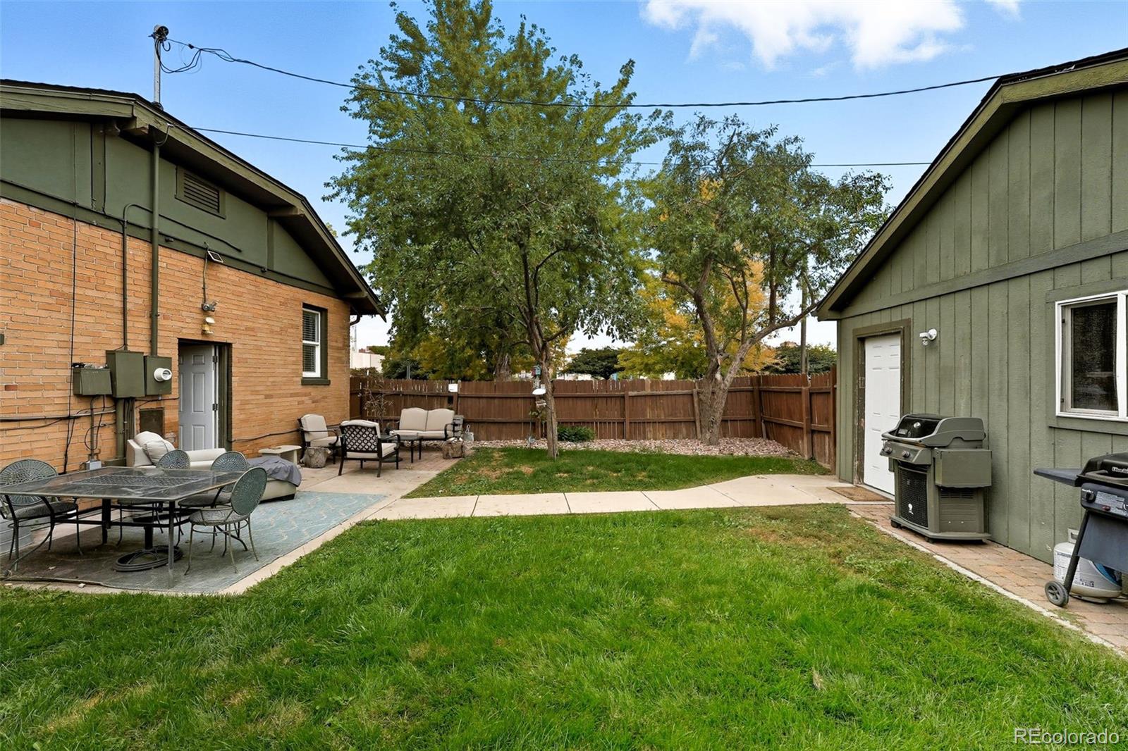 1280 Harrison Street Denver, CO 80206 - Photo 36 of 50 a view of a backyard with sitting area