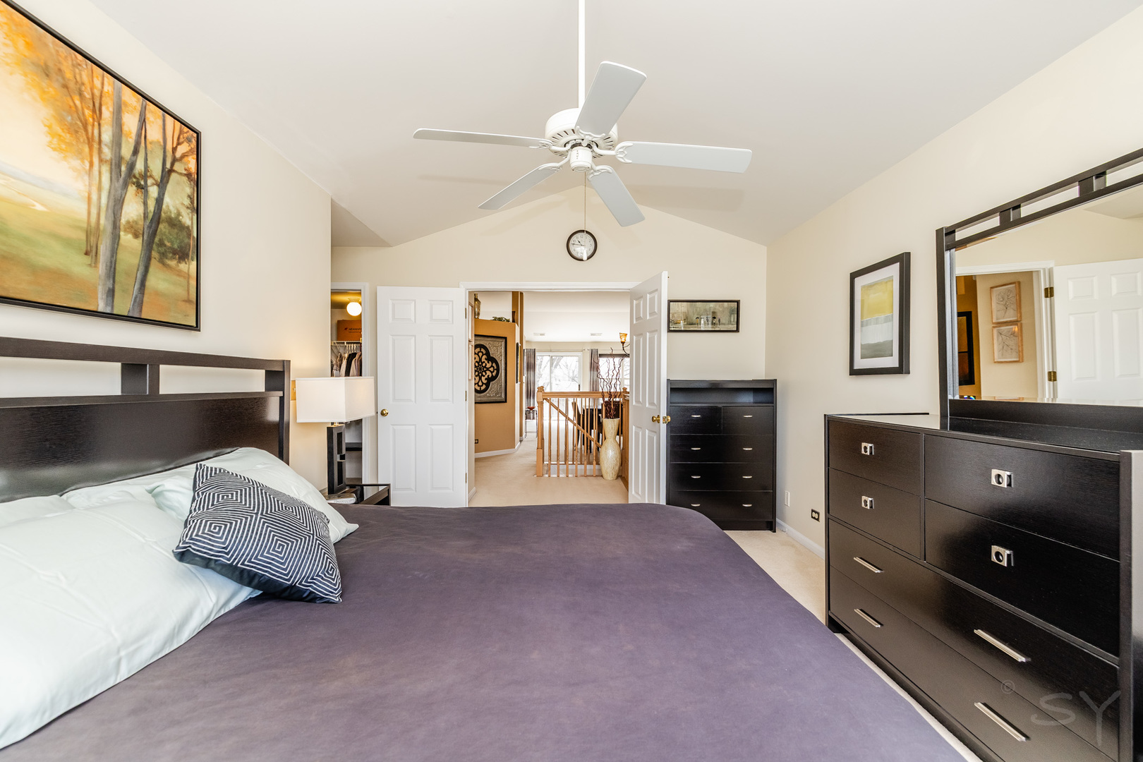 274 Wildspring Court Itasca, IL 60143 - Photo 22 of 42 a living room with furniture and a flat screen tv