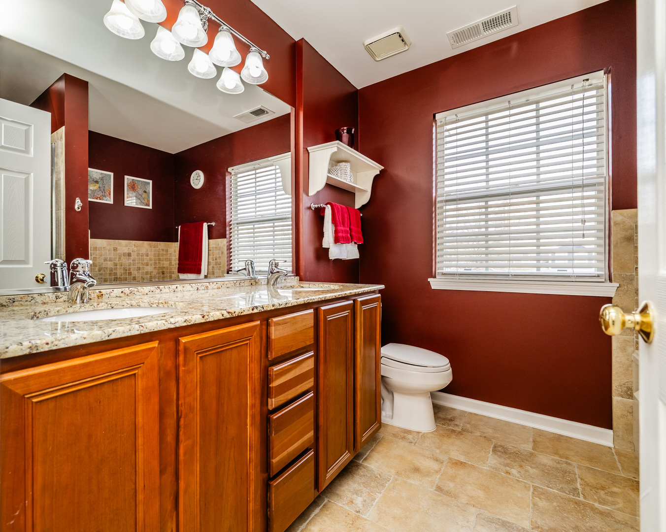 274 Wildspring Court Itasca, IL 60143 - Photo 23 of 42 a bathroom with a sink a vanity and a toilet