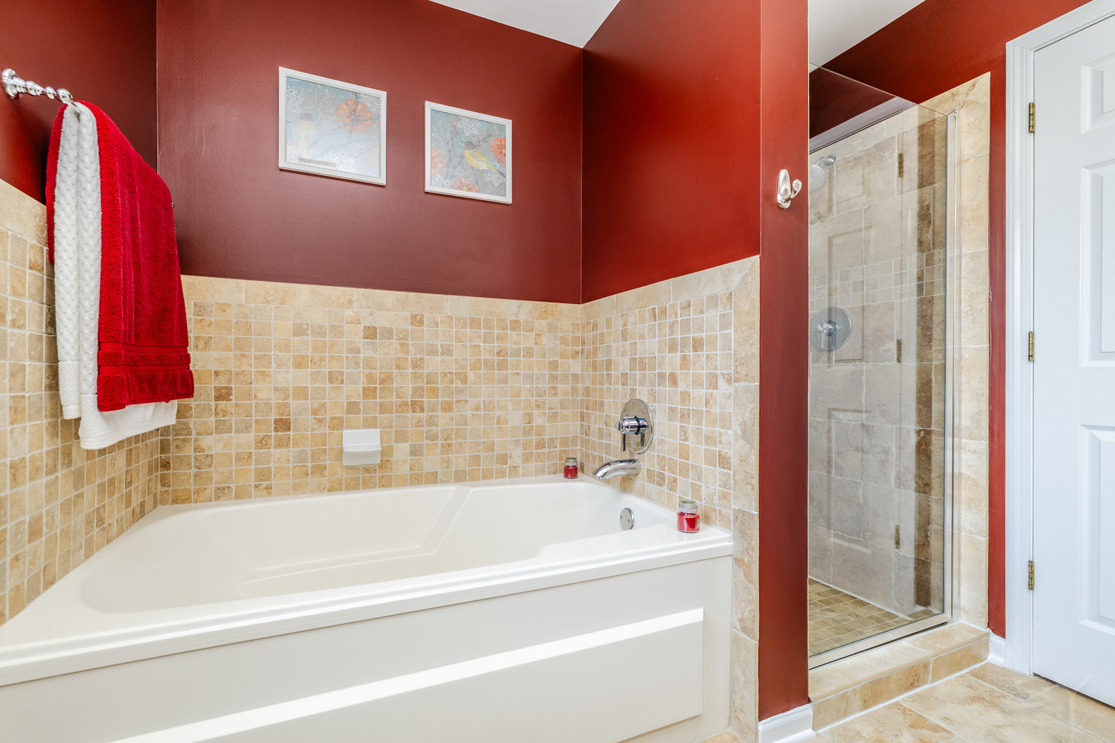 274 Wildspring Court Itasca, IL 60143 - Photo 24 of 42 a bathroom with a bathtub and a shower