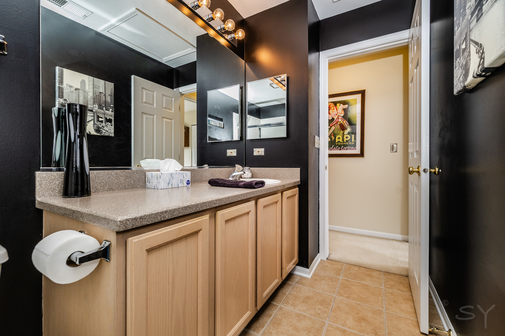 274 Wildspring Court Itasca, IL 60143 - Photo 29 of 42 a kitchen with stainless steel appliances granite countertop a sink and a refrigerator