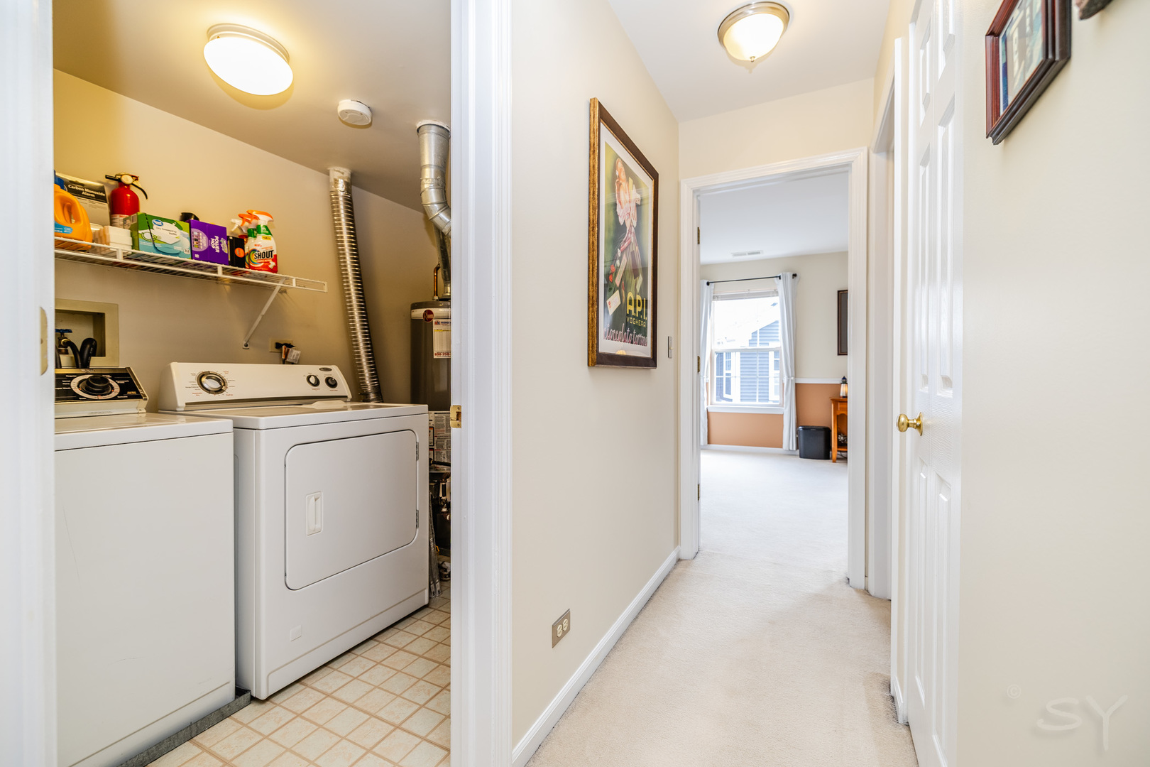 274 Wildspring Court Itasca, IL 60143 - Photo 33 of 42 a view of storage and utility room with a washer and dryer